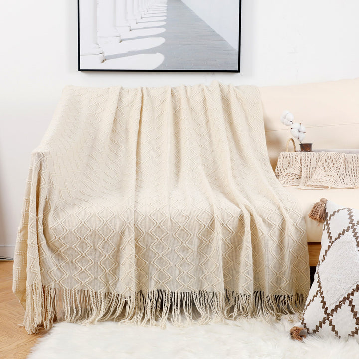Ladies elegant and cozy knitted blanket with fringes Kalsten
