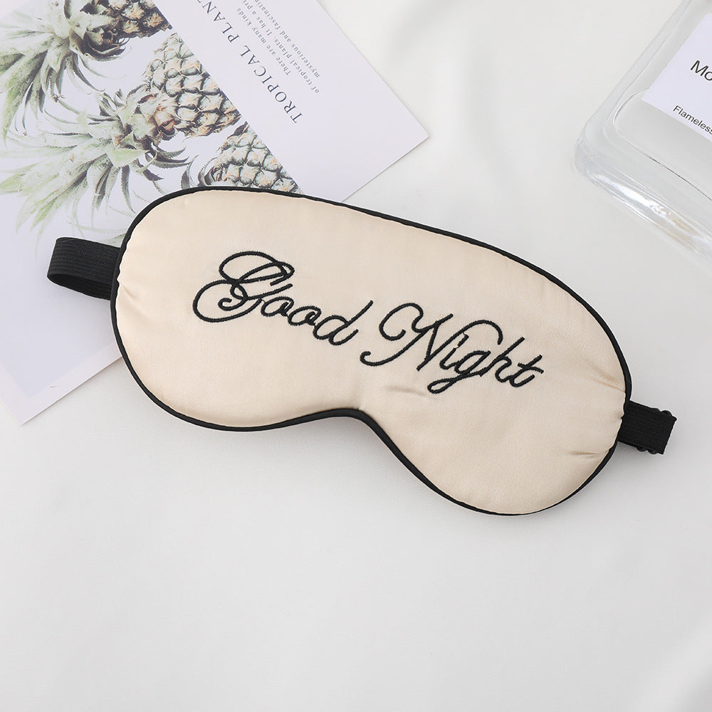 Unisex embroidered contoured sleep mask with decorative text embroidery and adjustable elastic band Kalsten