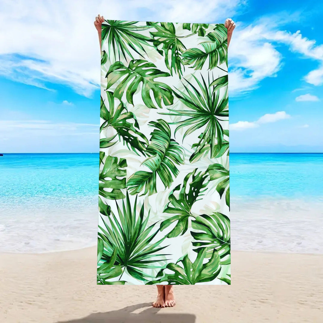Beach towel with tropical palm leaf pattern Kalsten