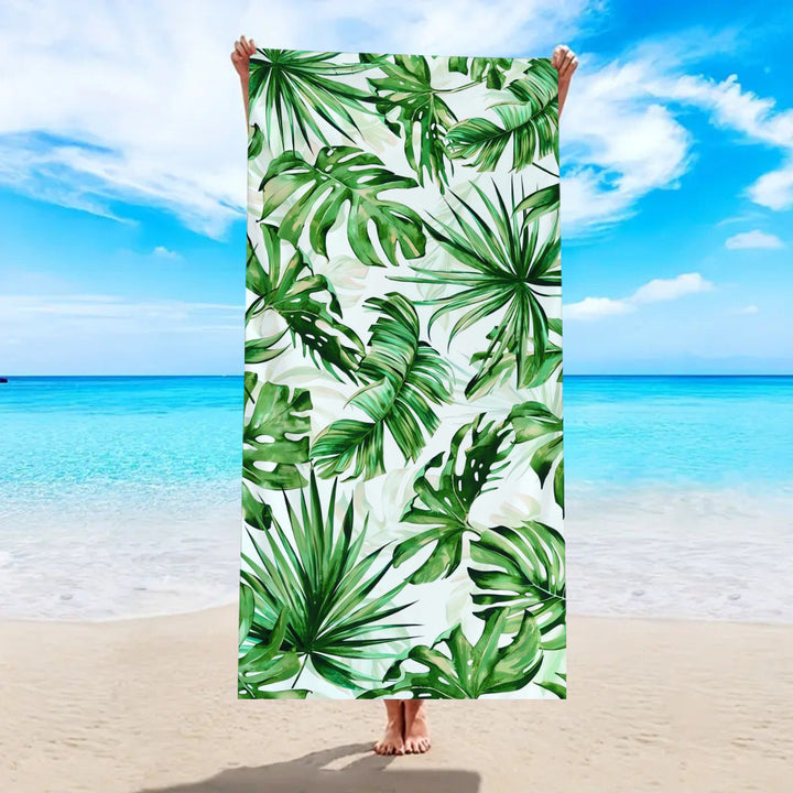 Beach towel with tropical palm leaf pattern Kalsten