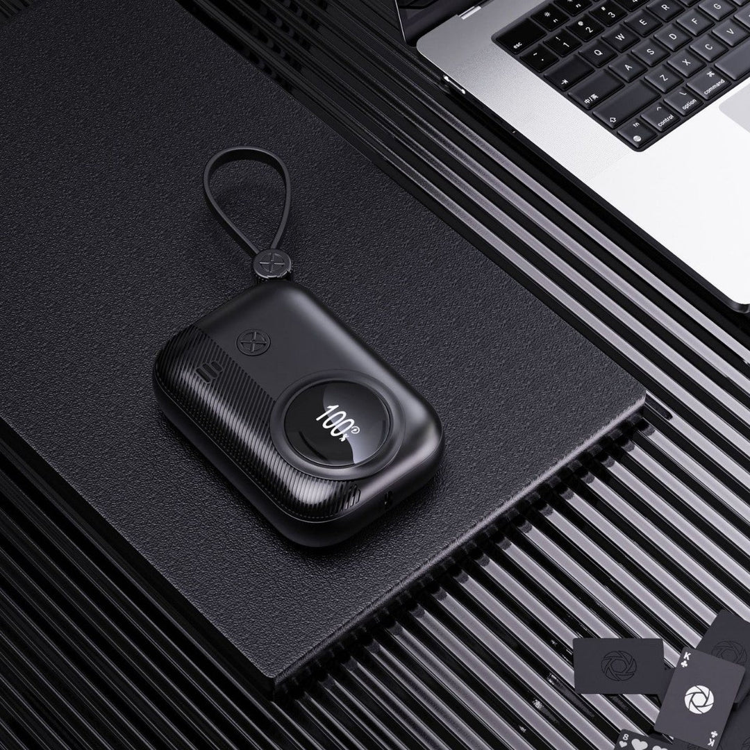 Compact power bank with integrated charging plug and digital humidity indicator Kalsten