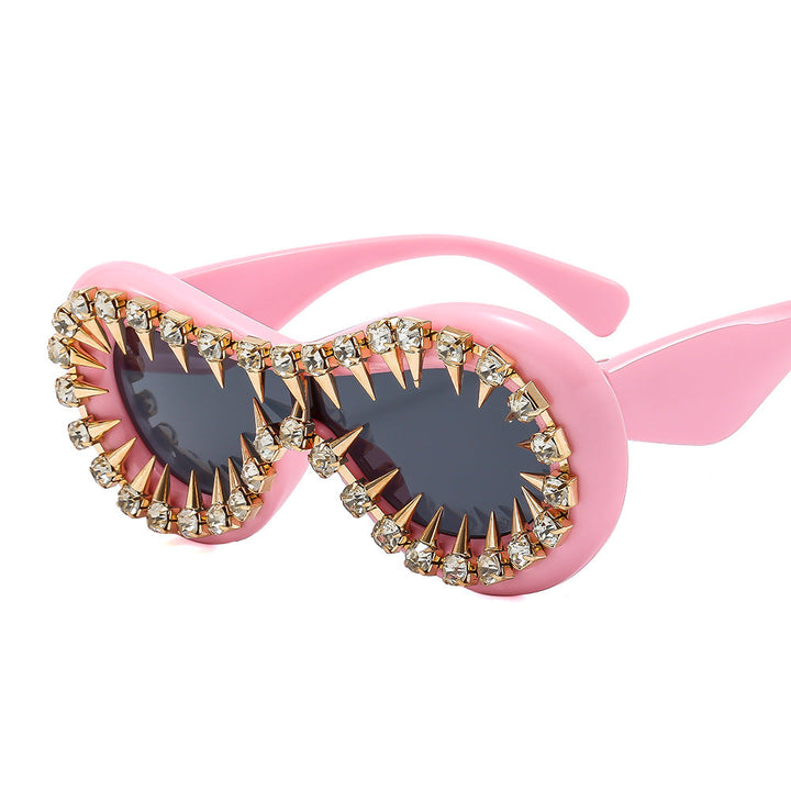Women's fashionable sunglasses with extravagant spikes and crystal embellishments Kalsten