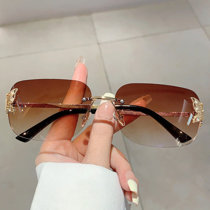 Ladies fashionable sunglasses with delicate butterfly design and protective lenses Kalsten