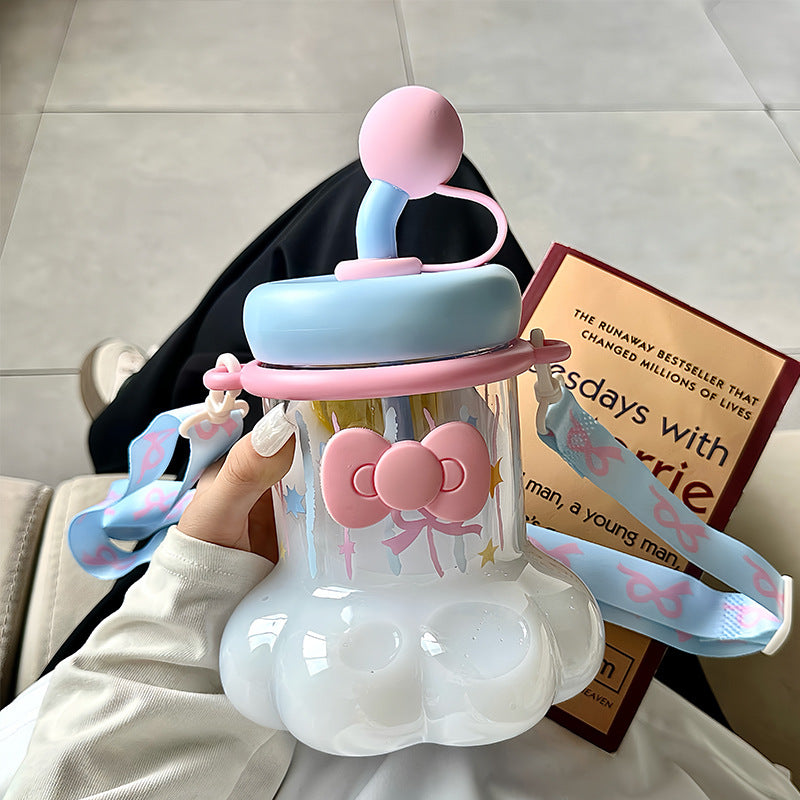Women's water bottle with integrated silicone carrying handle and playful design Kalsten
