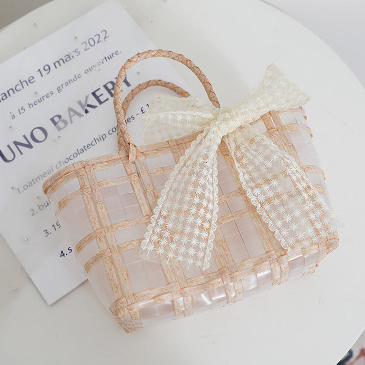 Handcrafted basket bag with elegant bow applique Kalsten