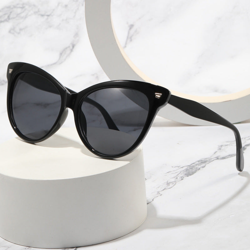 Ladies trendy cat-eye sunglasses with transparent frame and blue lenses Kalsten
