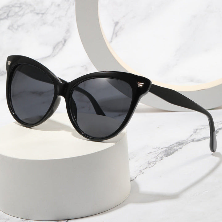 Ladies trendy cat-eye sunglasses with transparent frame and blue lenses Kalsten