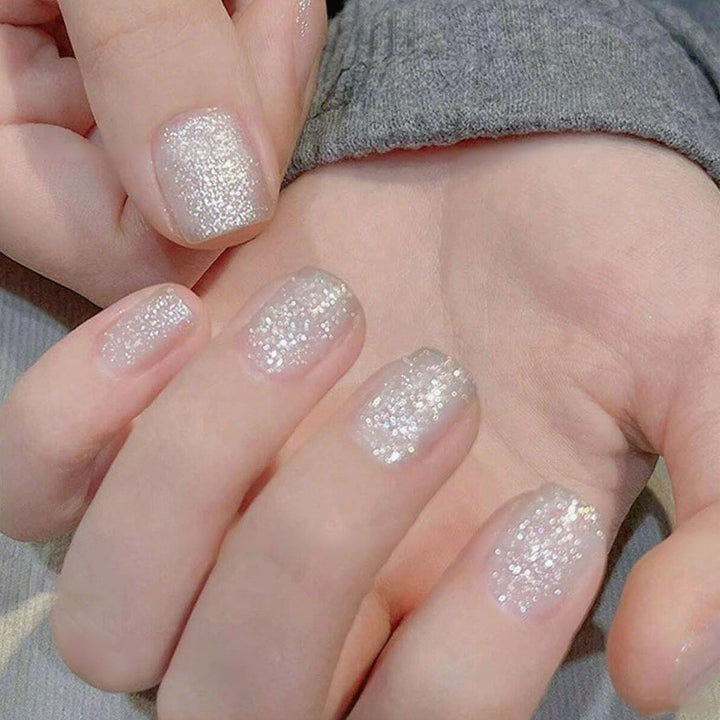 Glittering artificial nails in elegant ombre style Kalsten