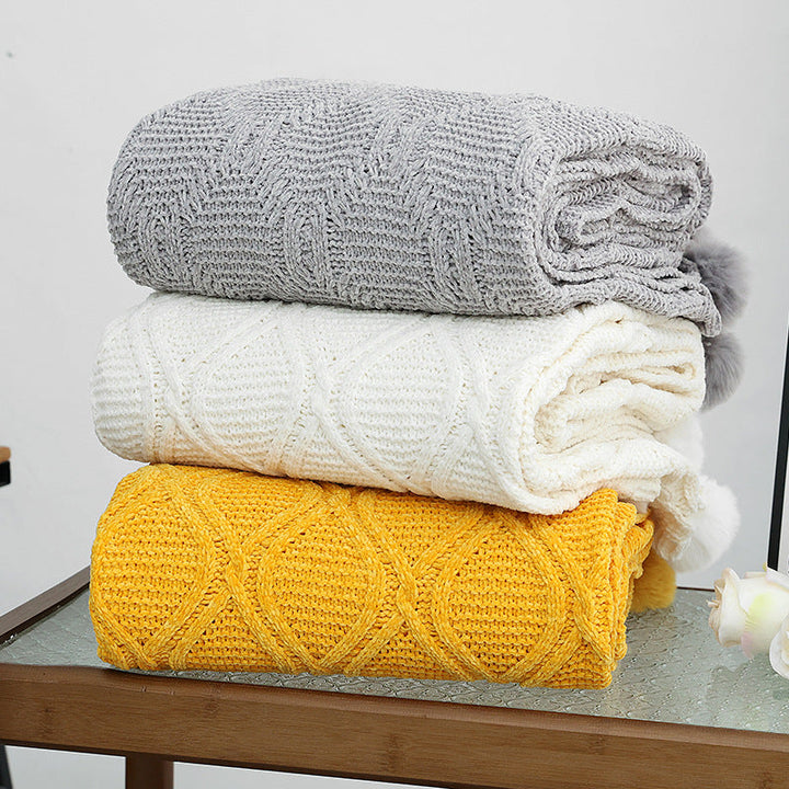 Ladies knit blanket with decorative pom poms Kalsten