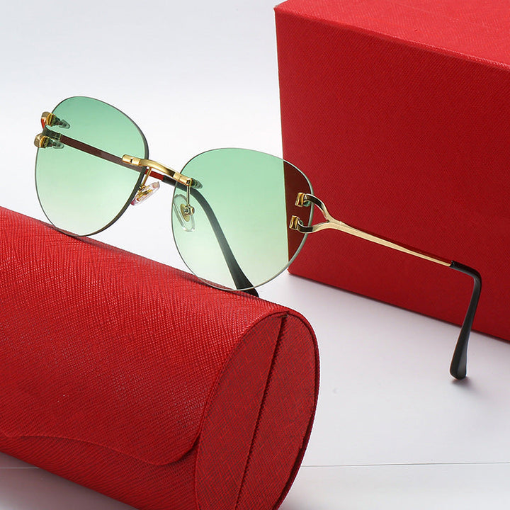 Ladies elegant Cat-Eye sunglasses with gold accents and UV protection Kalsten