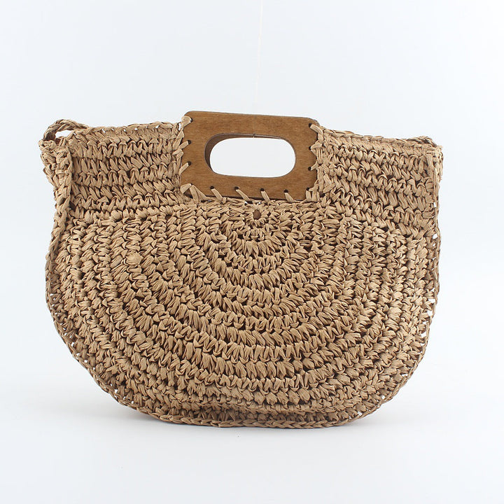 Handbag made of hand-woven natural material with stylish wooden handle Kalsten