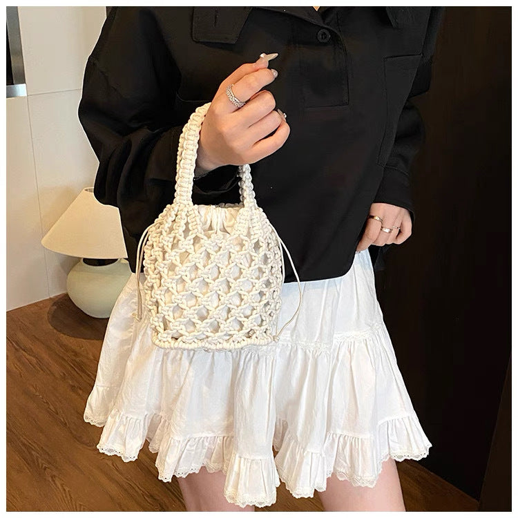 Fashionable handbag made of braided material Kalsten