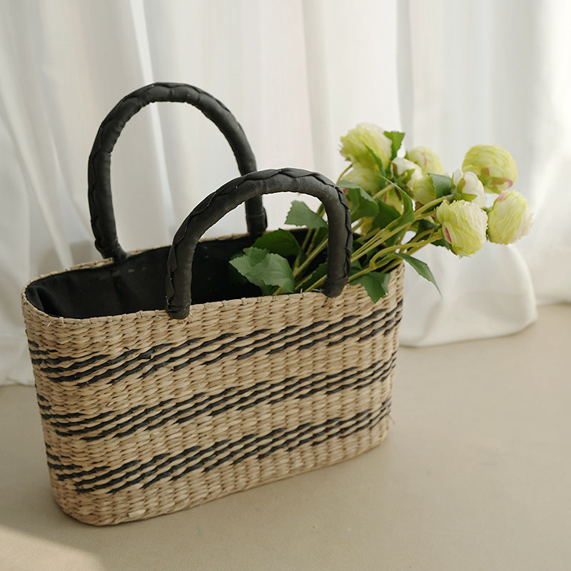 Women's handcrafted tote bag made from sustainable seagrass with stylish handles Kalsten