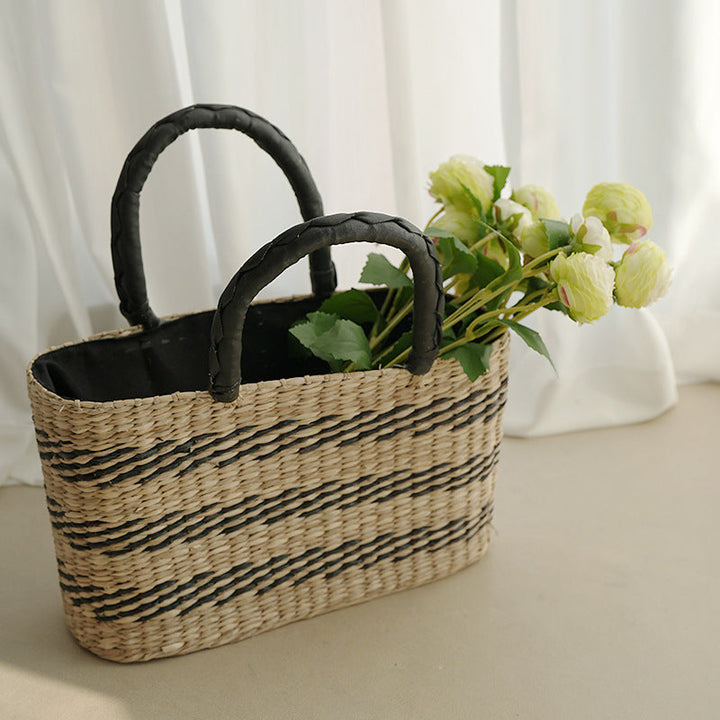Women's handcrafted tote bag made from sustainable seagrass with stylish handles Kalsten