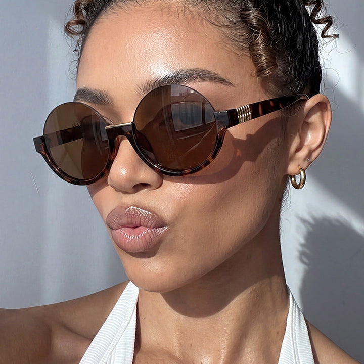 Women’s modern round sunglasses with elegant accents and UV protection Kalsten
