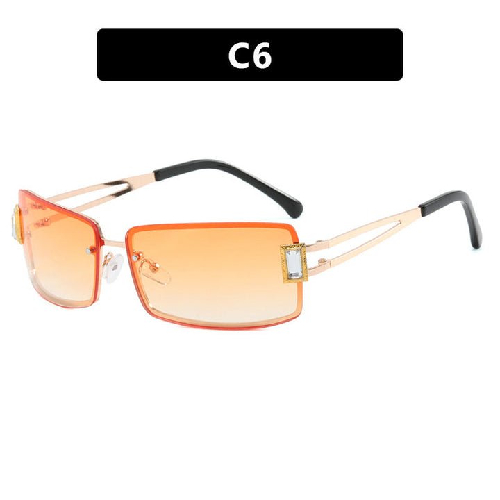 Ladies stylish sunglasses with elegant trapezoidal lenses and filigree metal frame Kalsten