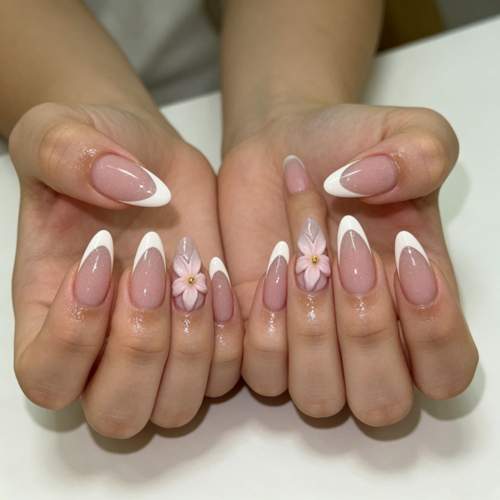 Artificial nails with floral decoration and elegant French tip design Kalsten