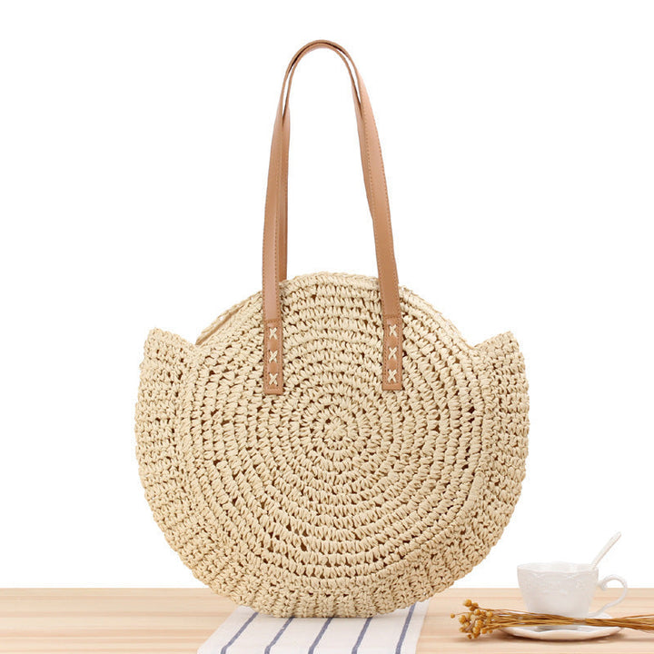 Round straw bag with leather handles Kalsten