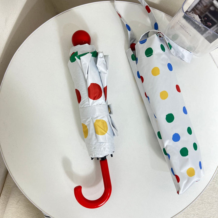 Ladies designer foldable umbrella with colorful polka dot pattern Kalsten