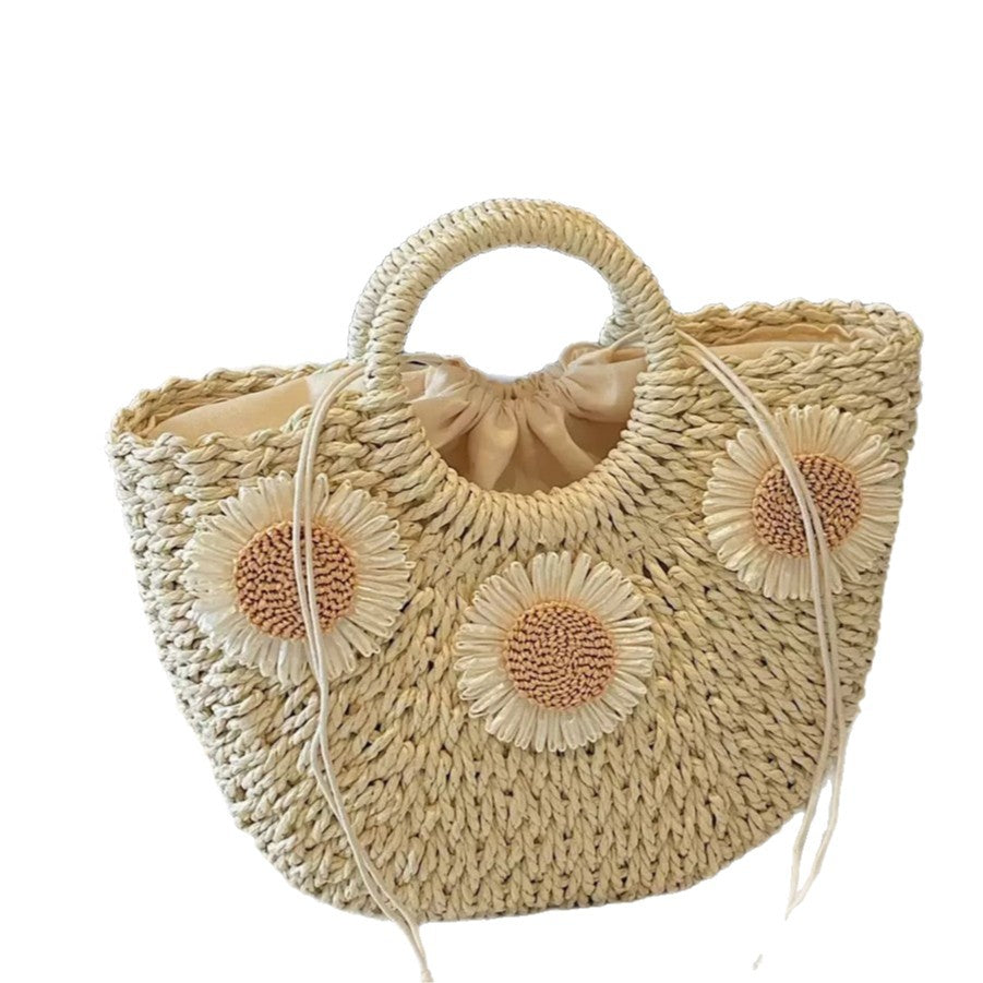 Handbag made of natural material with floral accents Kalsten