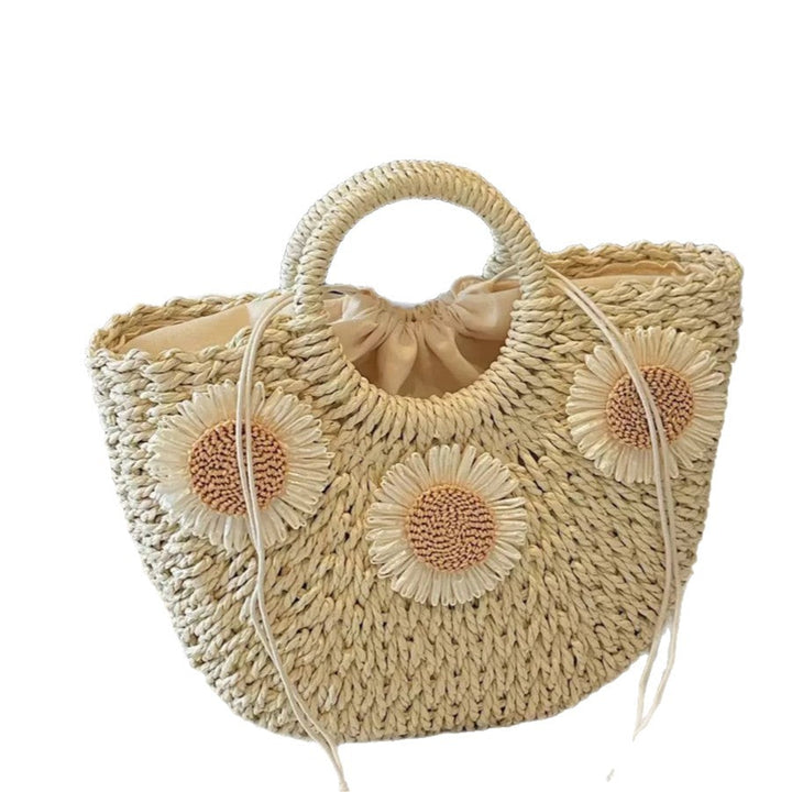 Handbag made of natural material with floral accents Kalsten