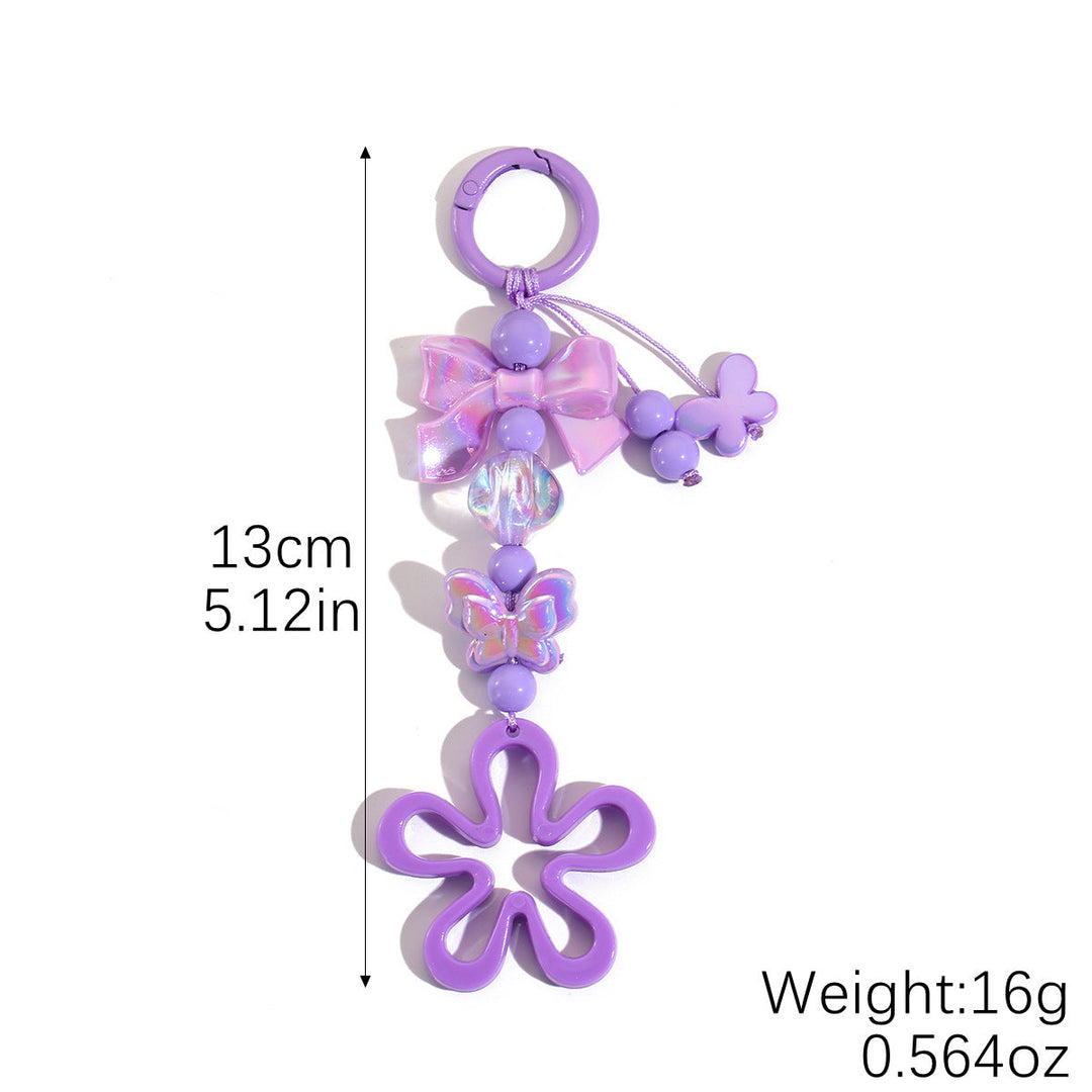 Playful keychain with flower and butterfly details Kalsten