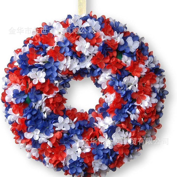 Independence Day rustic round wooden patriotic cross wall plaque with floral accents and God Bless America banner Kalsten