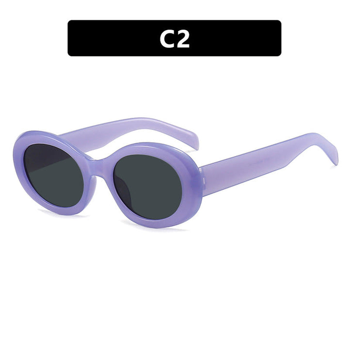 Women's fashionable sunglasses in original oval design with transparent frame and UV protection Kalsten