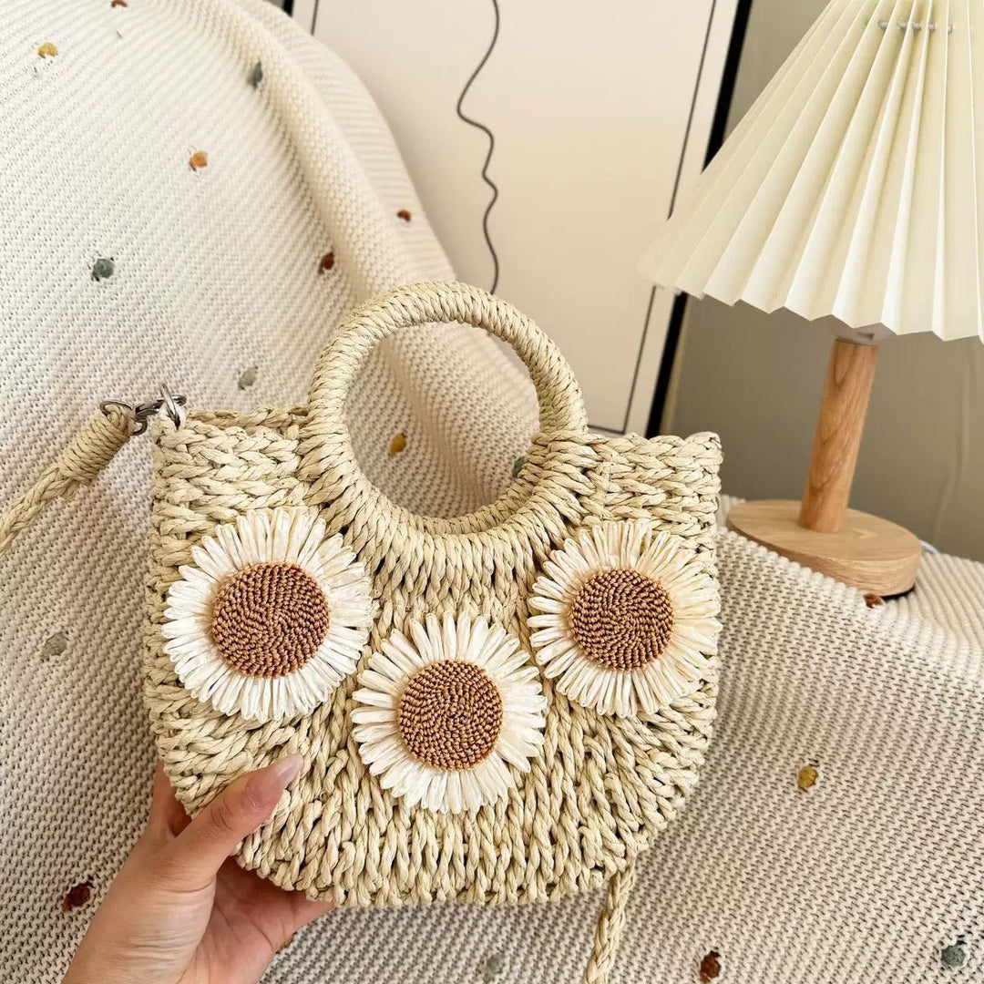 Handbag made of natural material with floral accents Kalsten