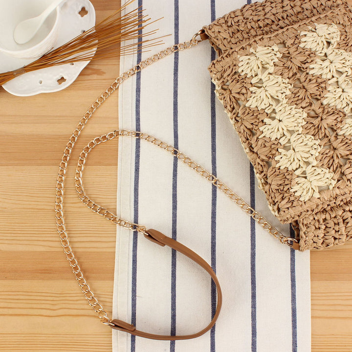 Shoulder bag made of handcrafted braided natural material with elegant closure Kalsten