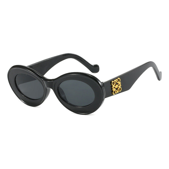 Women's fashionable sunglasses with oval frame and golden accents Kalsten