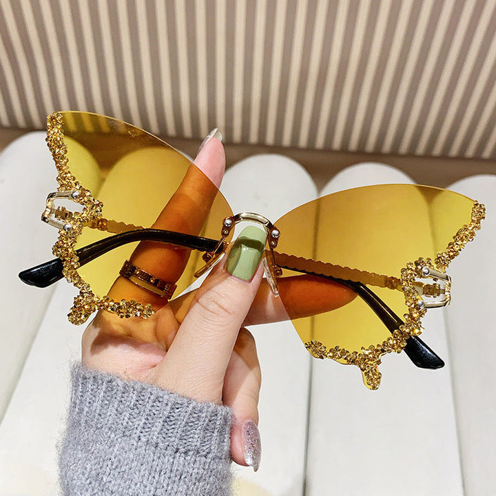 Women's extravagant sunglasses with sparkling butterfly design Kalsten