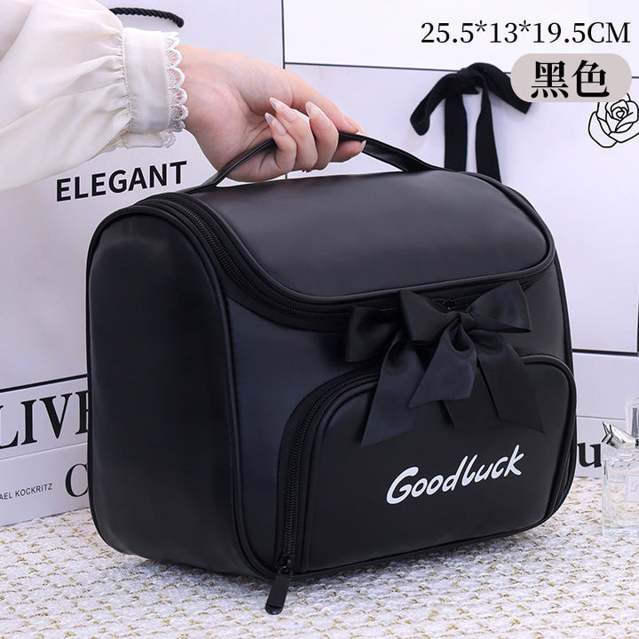Cosmetic and toiletry bag with elegant bow accent Kalsten