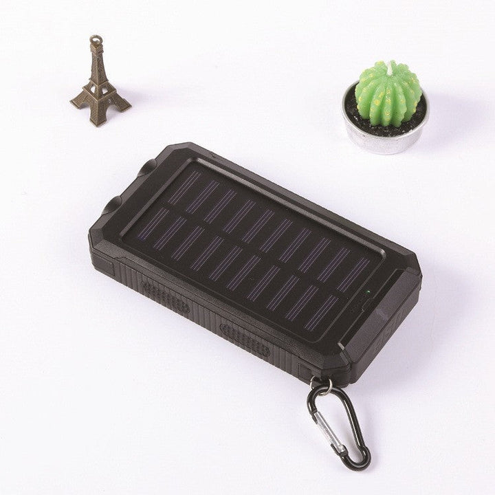 Solar charger with integrated compass and LED flashlight Kalsten