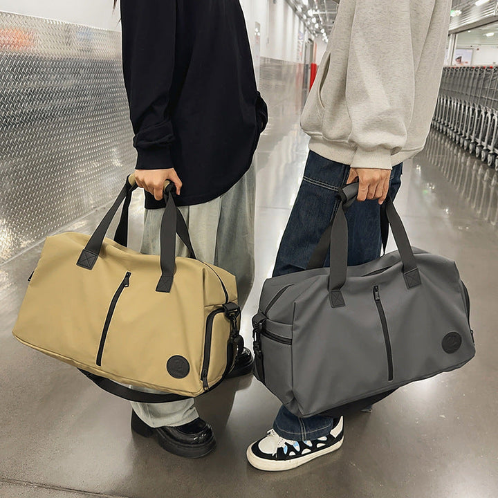 Sporty travel bag with water-repellent material and practical organizer compartments Kalsten