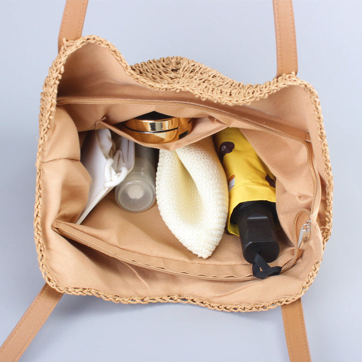 Casual bag made of handwoven straw with wide leather handles Kalsten