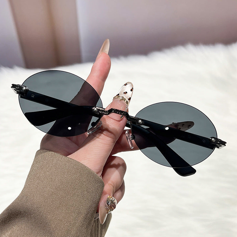 Ladies fashionable and elegant sunglasses with oval design Kalsten