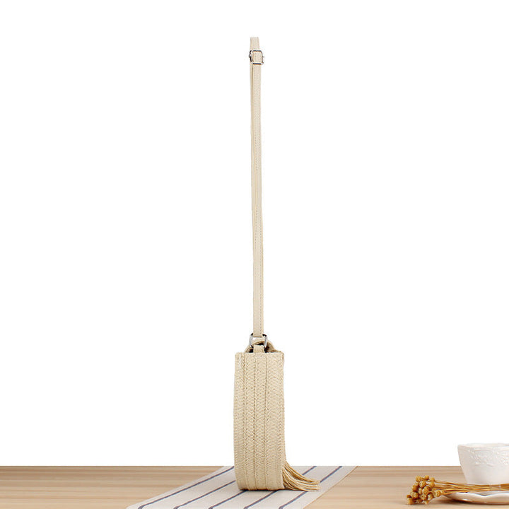 Round Bast Crossbody Bag with Tassels by Kalsten