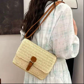 Handbag made of woven natural material with leather accents Kalsten