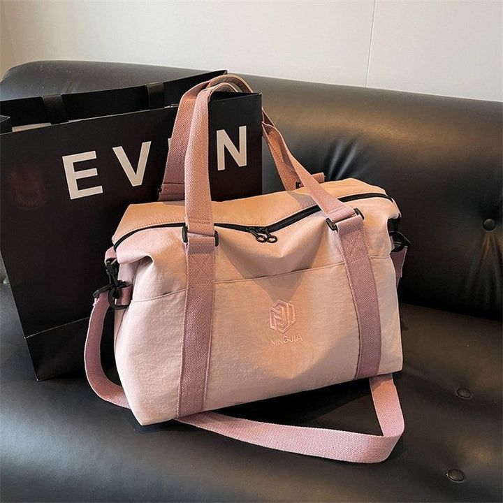 Sporty tote bag with multiple compartments and adjustable straps Kalsten