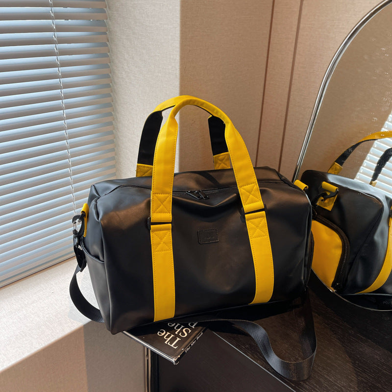 Sporty duffel bag with durable water-repellent material and versatile carrying options Kalsten