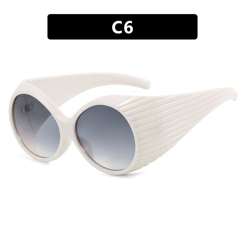 Women's extravagant sunglasses with curved frame Kalsten
