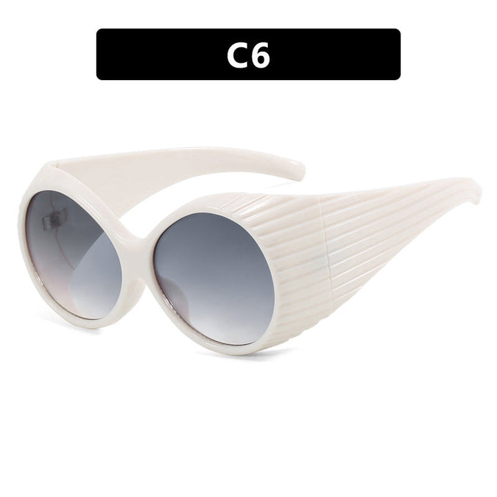Women's extravagant sunglasses with curved frame Kalsten