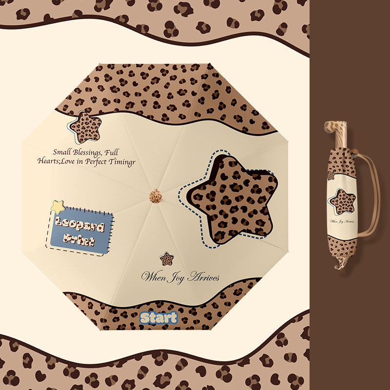 Ladies folding umbrella with playful design Kalsten