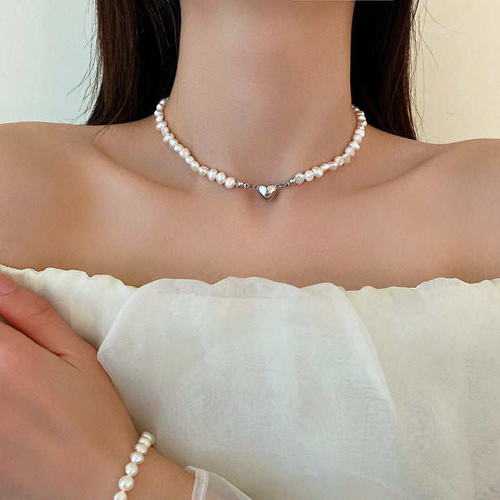 Elegant silver pearl bracelet with heart details Kalsten