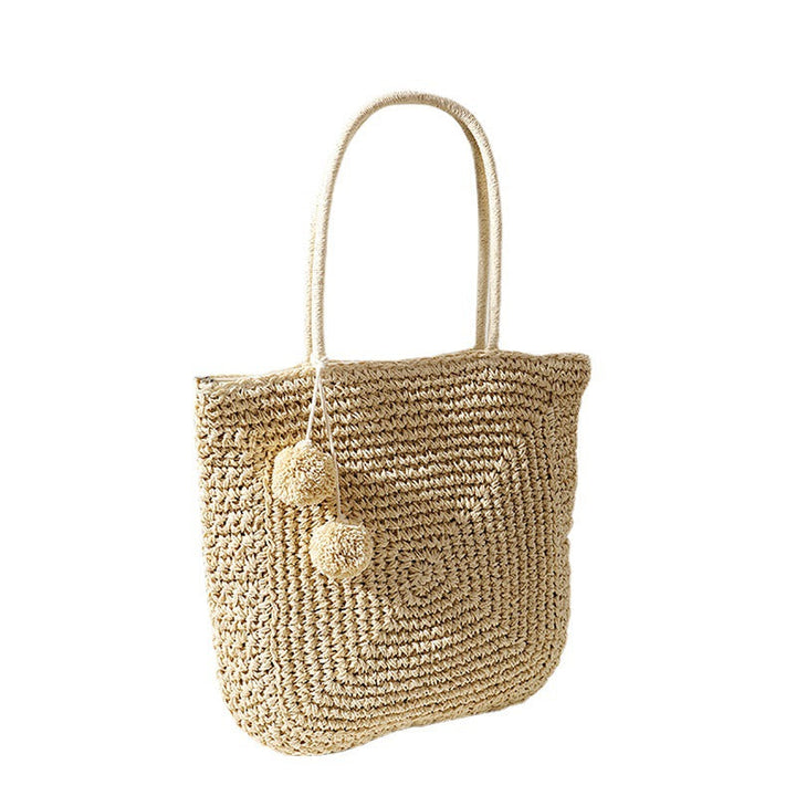 Handmade straw bag with pompom details Kalsten