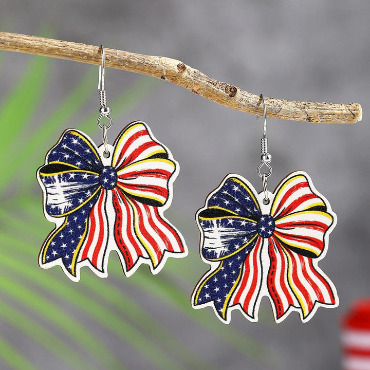 Ladies' lightweight wooden earrings in airplane jet design with patriotic motif and hypoallergenic fish hook Kalsten
