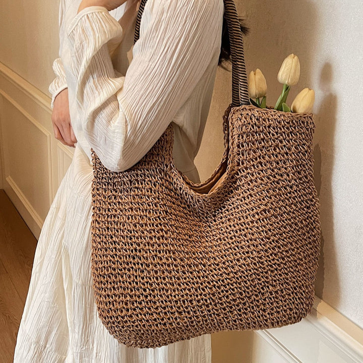 Elegant Handbag Made from Hand-Woven Natural Material with Striped Handles Kalsten