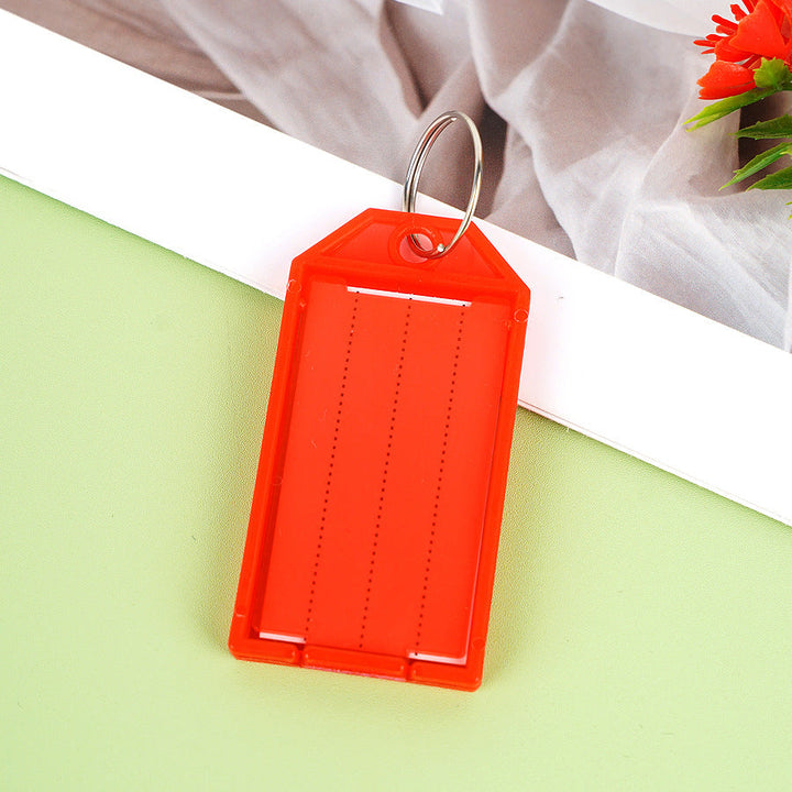 Unisex label tag with transparent sleeve and three writable fields Kalsten