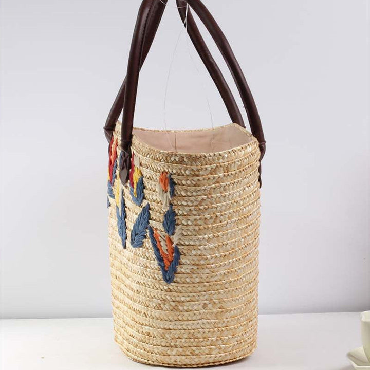 Braided beach bag with colorful embroidery pattern Kalsten